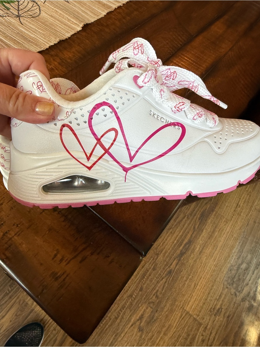 Skechers women's White Sneakers with Pink Heart Accents